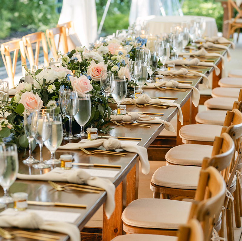 new-long-table-setting-with-peach-roses-gold-cutlery-cream-chairs