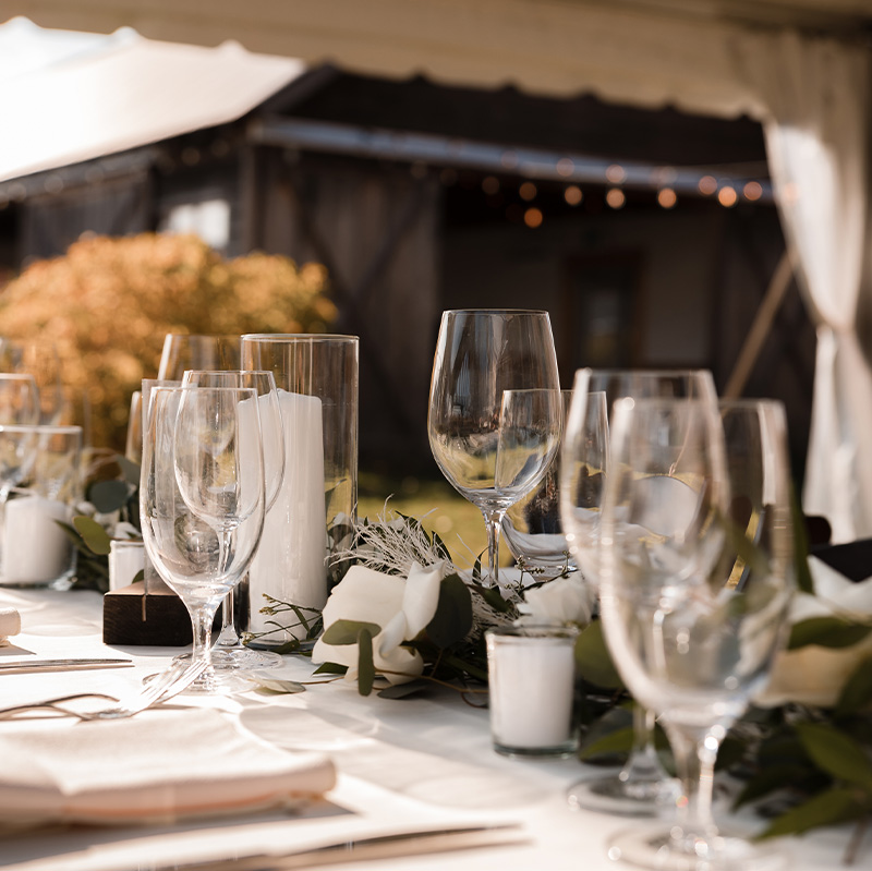 close-up-of-a-white-tablecloth-with-cream-linen-napkins.jpg