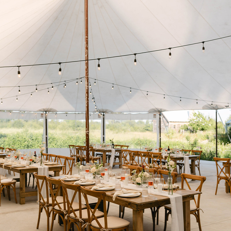 elegant-lighting-illuminating-the-interior-of-a-wedding-or-event-tent.jpg