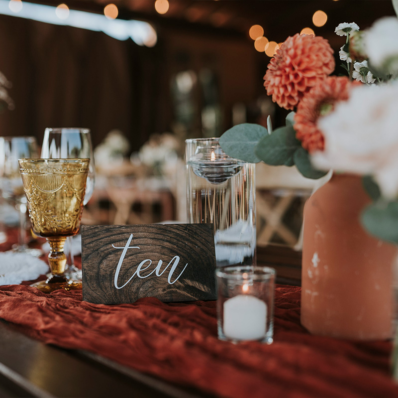 elegant-table-setting-with-gold-rust-and-sage-color-scheme